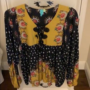 Anthropologie top by farm in black and mustard